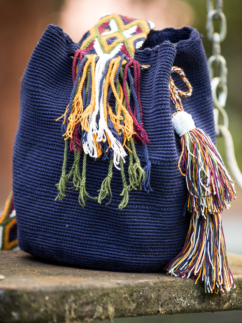 Dark blue and mustard woven shoulder bag with tassels and white beads Palmazul Beachwear Wayuu Mochila